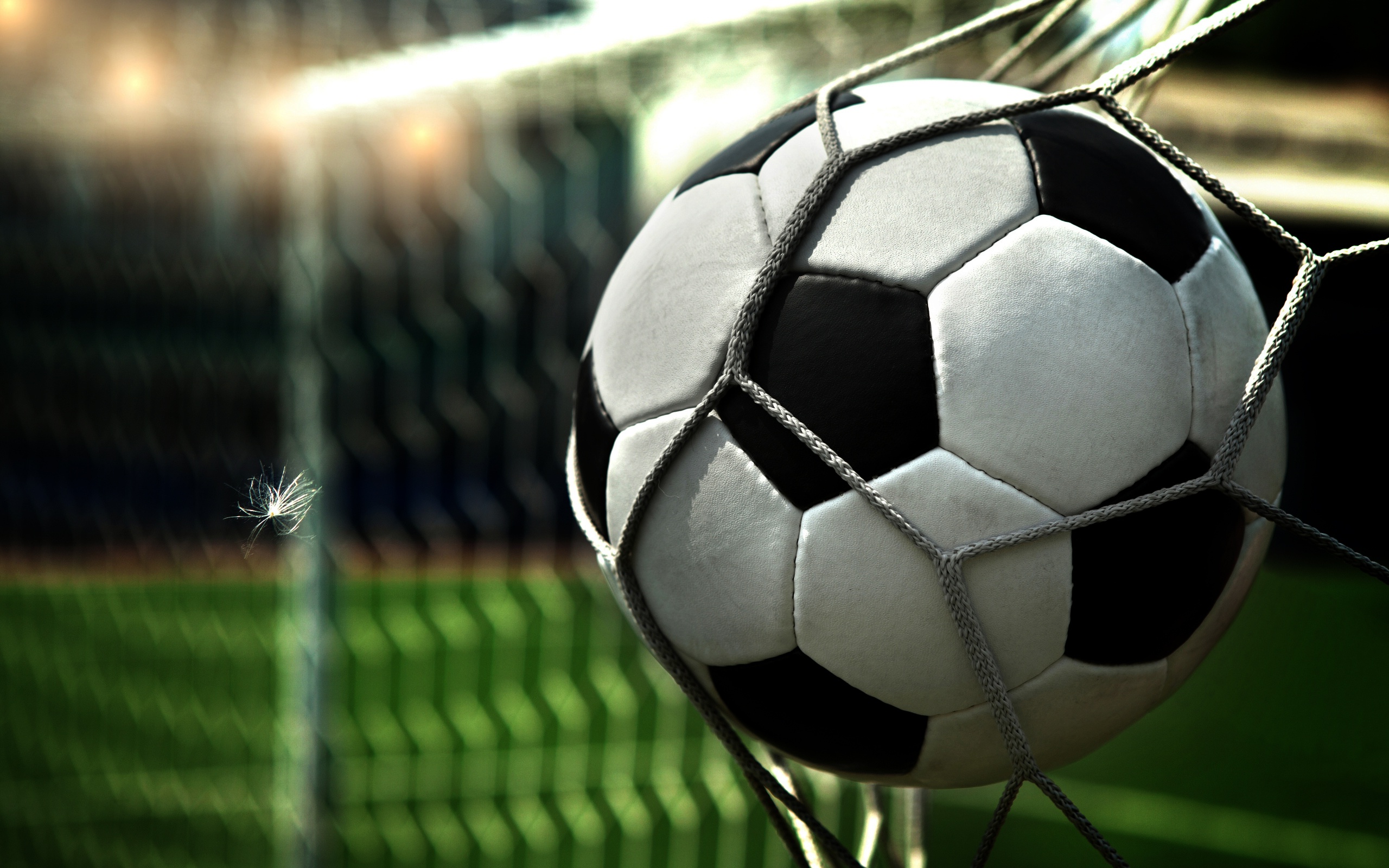 Soccer ball entering goal, football powerpoint template